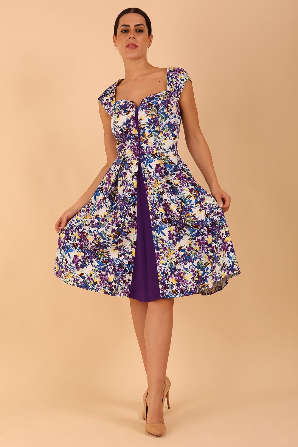 model wearing a diva catwalk Shayla Swing Dress sleeveless swing skirt dress in kew print colour front