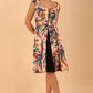 model wearing a diva catwalk Shayla Swing Dress sleeveless swing skirt dress in rainforest print colour front