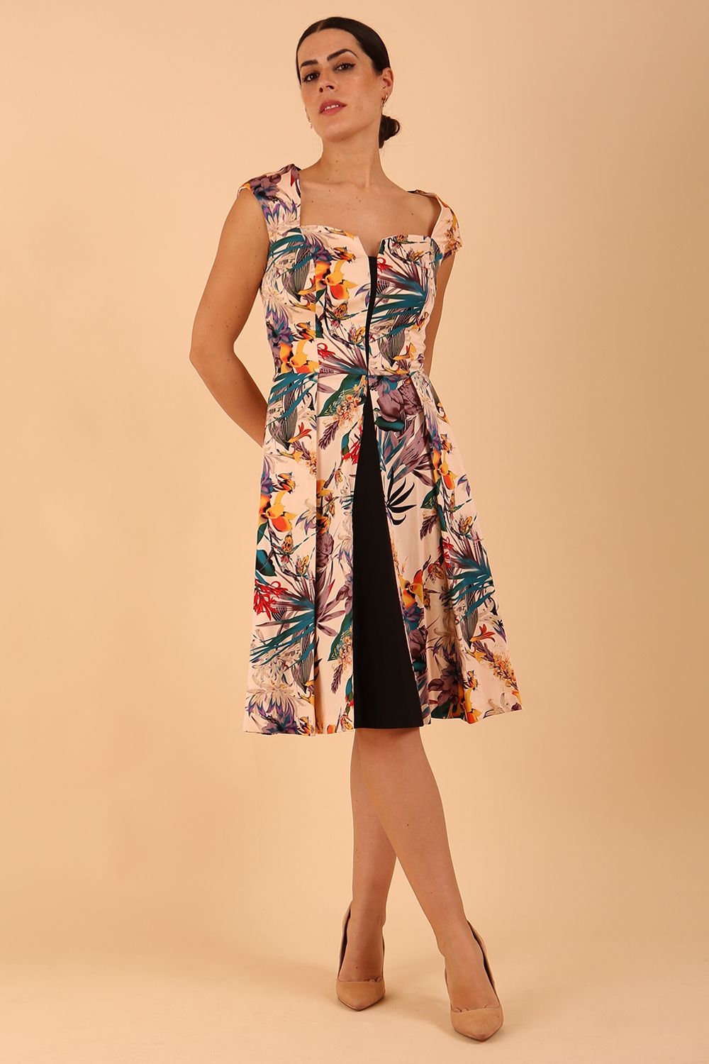 model wearing a diva catwalk Shayla Swing Dress sleeveless swing skirt dress in rainforest print colour front