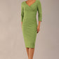 model wearing a diva catwalk Seed Barton Sleeved Pencil Dress 3/4 sleeves and v neckline and knee length with pleating details in citrus green colour