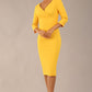 model wearing a diva catwalk Seed Barton Sleeved Pencil Dress 3/4 sleeves and v neckline and knee length with pleating details in daffodil yellow colour