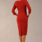 model wearing a diva catwalk Seed Barton Sleeved Pencil Dress 3/4 sleeves and v neckline and knee length with pleating details in garnet red colour