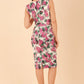 Model wearing the Diva Serenity Palm dress in pencil dress design in palm print back image