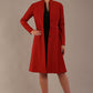 blonde model wearing diva catwalk couture fine raquella coat with buttons across the front and long sleeves with high neck and pockets in garnet red colour front (Garnet Red)