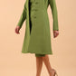model wearing diva catwalk couture fine raquella coat with buttons across the front and long sleeves with high neck and pockets in citrus green colour front side