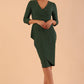 Model wearing DIVA Seed Rosemary Low V-Neckline Sleeved Pencil Dress in chrome green colour