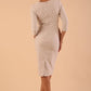 Model wearing DIVA Seed Rosemary Low V-Neckline Sleeved Pencil Dress in sandy cream colour