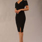 brunette model wearing diva catwalk amorette pencil skirt dress with a cold shoulder detaul and pleating across the bust and slit on a side of skirt in black front