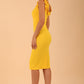 brunette model is wearing diva catwalk odessa pencil sleeveless dress with frill detail on rounded neckline in freesia yellow side back