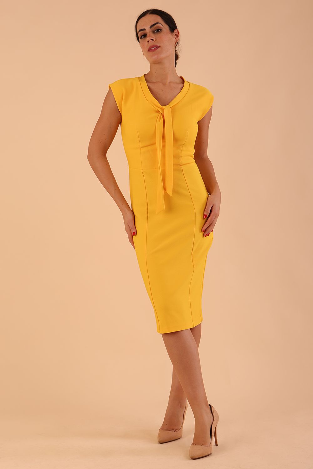 Model wearing Seed Lucca Tie Detail Sleeveless Pencil Dress in daffodil yellow colour