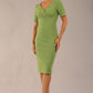 model is wearing diva catwalk seed barton short sleeve pencil dress with v-neck in citrus green front 