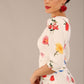 brunette model is wearing a diva catwalk Cynthia Floral Print Dress sleeved crossover v neckline knee length in Buttercup Print back image