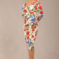 brunette model is wearing a diva catwalk Cynthia Floral Print Dress sleeved crossover v neckline knee length in Eden Print front image