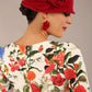 brunette model is wearing a diva catwalk Cynthia Floral Print Dress sleeved crossover v neckline knee length in Eden Print back image