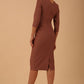 Model wearing diva catwalk Seed Divine Dress 3/4 sleeved knee length in acorn brown colour
