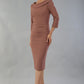 model wearing a divacatwalk Seed Spotlight Round Collar Dress 3/4 sleeve knee length in acorn brown colour