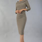 model wearing a divacatwalk Seed Spotlight Round Collar Dress 3/4 sleeve knee length in taupe brown colour