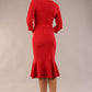 model wearing a diva catwalk Seed Brecon Fishtail Sleeved Dress in salsa red colour back