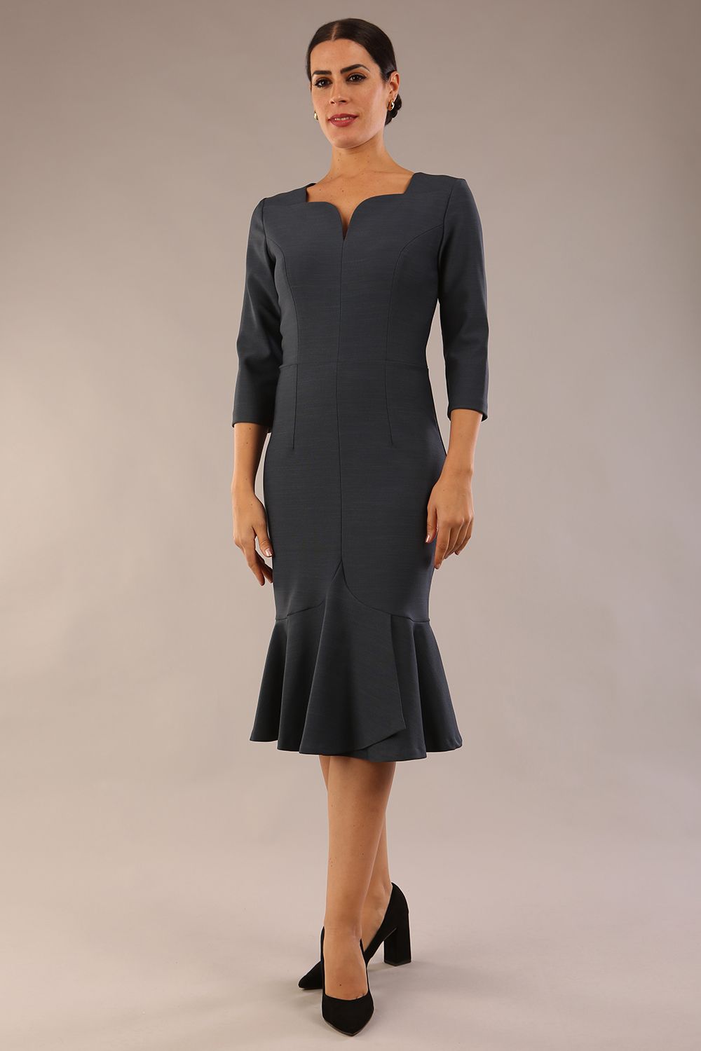 model is wearing a diva catwalk Seed Brecon Fishtail Sleeved Dress in slate grey colour front