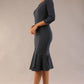 model is wearing a diva catwalk Seed Brecon Fishtail Sleeved Dress in slate grey colour side front