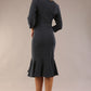 model is wearing a diva catwalk Seed Brecon Fishtail Sleeved Dress in slate grey colour back