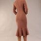 model wearing a diva catwalk Seed Brecon Fishtail Sleeved Dress in acorn brown colour back