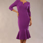 model wearing a diva catwalk Seed Brecon Fishtail Sleeved Dress in amethyst purple colour front