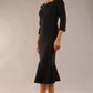 model is wearing a diva catwalk Seed Brecon Fishtail Sleeved Dress in black colour side front