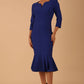 model wearing a diva catwalk Seed Brecon Fishtail Sleeved Dress in monaco blue colour