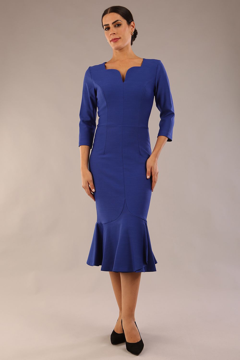 model is wearing a diva catwalk Seed Brecon Fishtail Sleeved Dress in monaco blue colour front