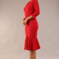 model is wearing a diva catwalk Seed Brecon Fishtail Sleeved Dress in salsa red colour side front