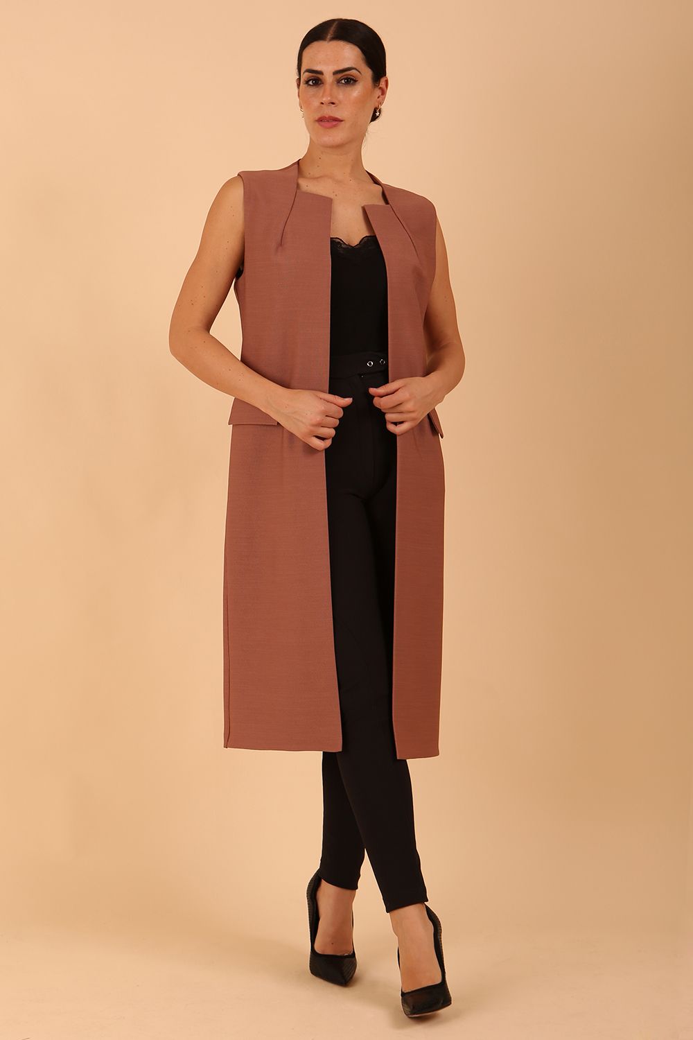model wearing a divacatwalk Seed Harvard Sleeveless Coat midi length in Amethyst Purple colour front