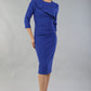 model wearing a diva catwalk Seed Aspley Sleeved Pencil Skirt Casual Dress with 3/4 sleeve and knee length in monaco blue colour