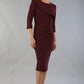 model wearing a diva catwalk Seed Aspley Sleeved Pencil Skirt Casual Dress with 3/4 sleeve and knee length in port royale colour