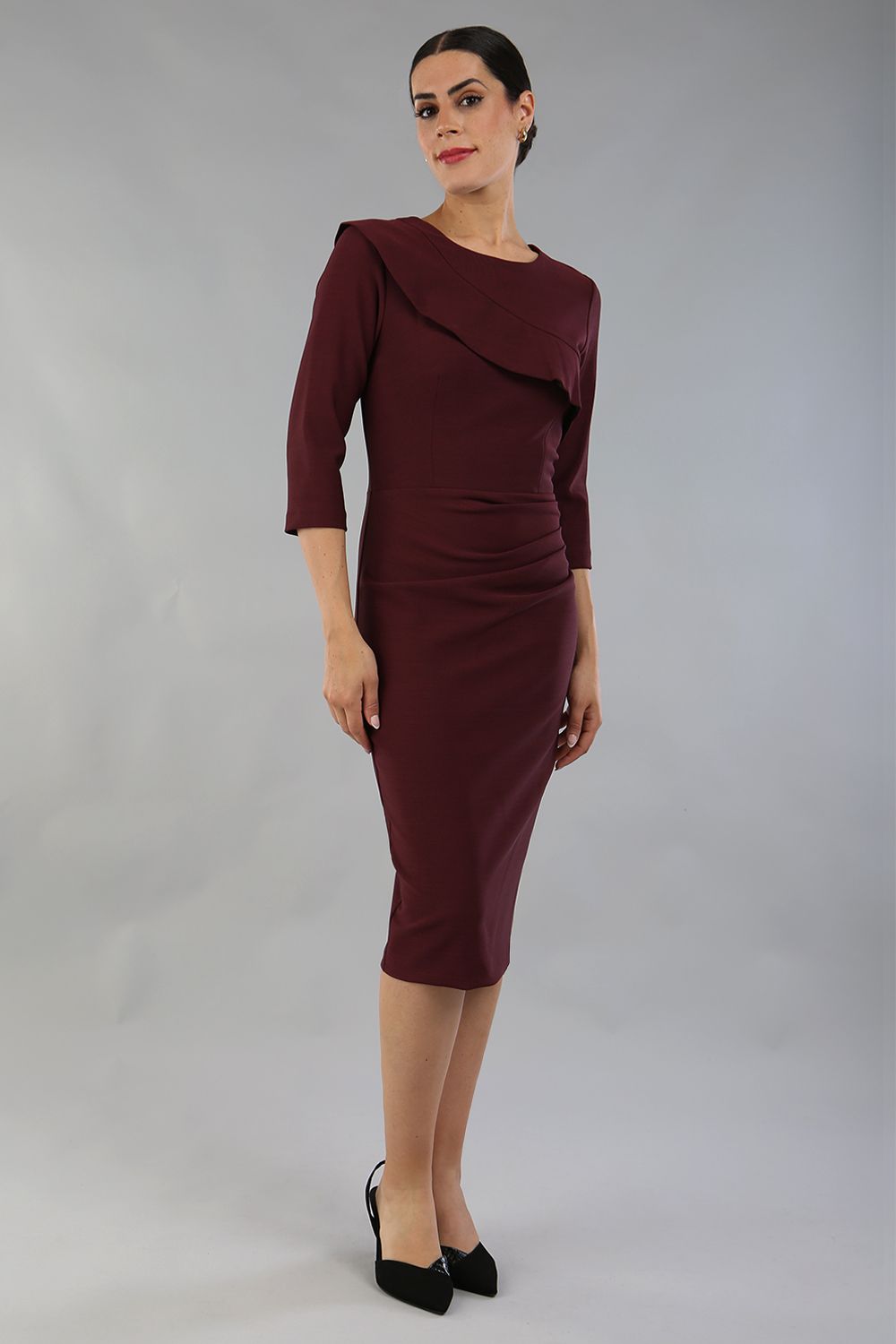 model wearing a diva catwalk Seed Aspley Sleeved Pencil Skirt Casual Dress with 3/4 sleeve and knee length in port royale colour