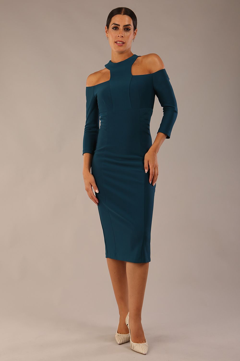 model is wearing diva catwalk kelso sleeved pencil dress with shoulder cut out and rounded high neck in glorious teal front