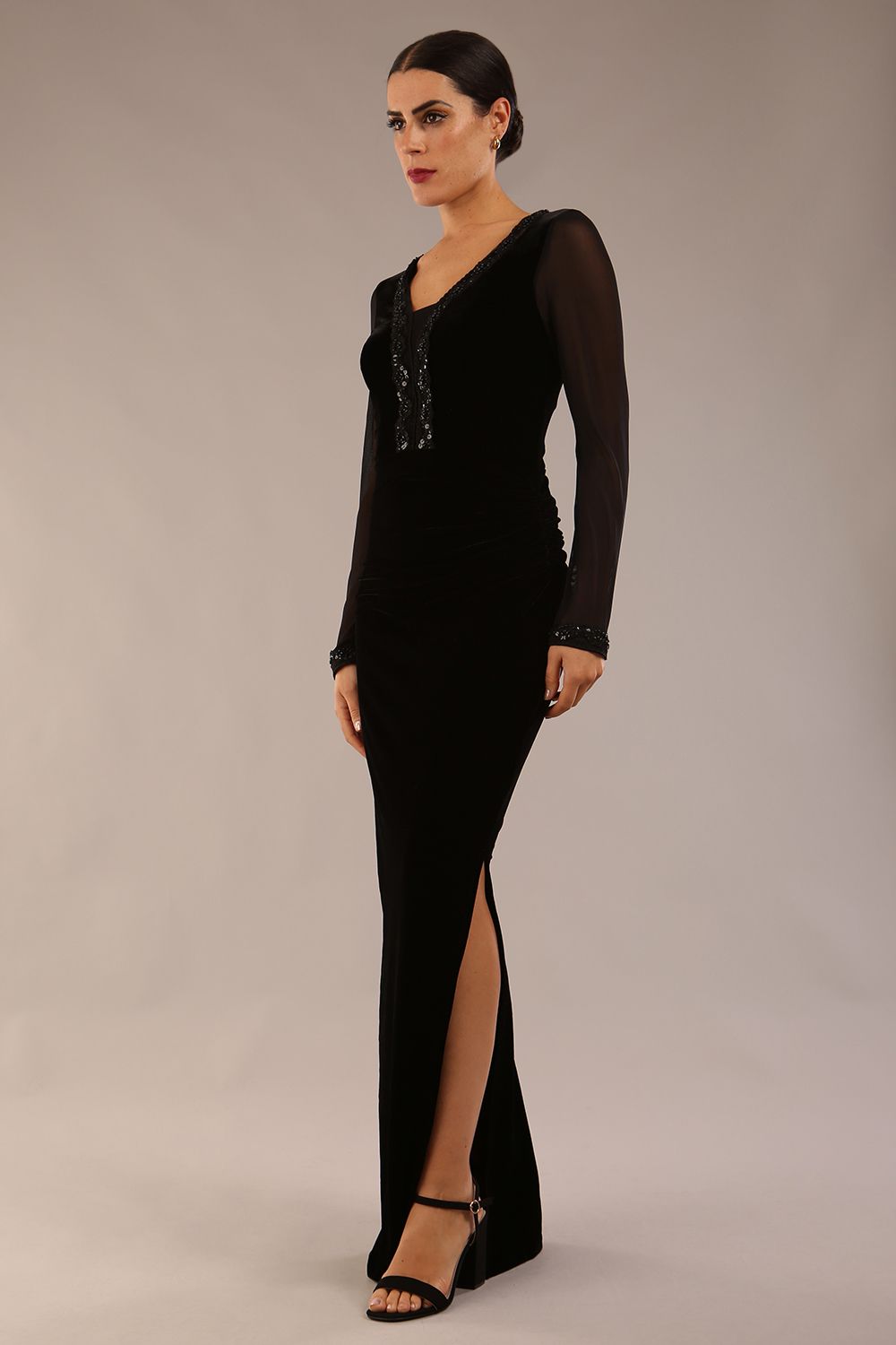 Model wearing diva catwalk Isabella Velvelt Long Sleeve Maxi Length Dress in Black side