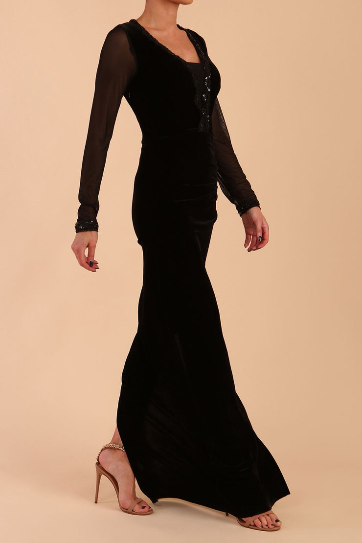 Model wearing diva catwalk Isabella Velvelt Long Sleeve Maxi Length Dress in Black side