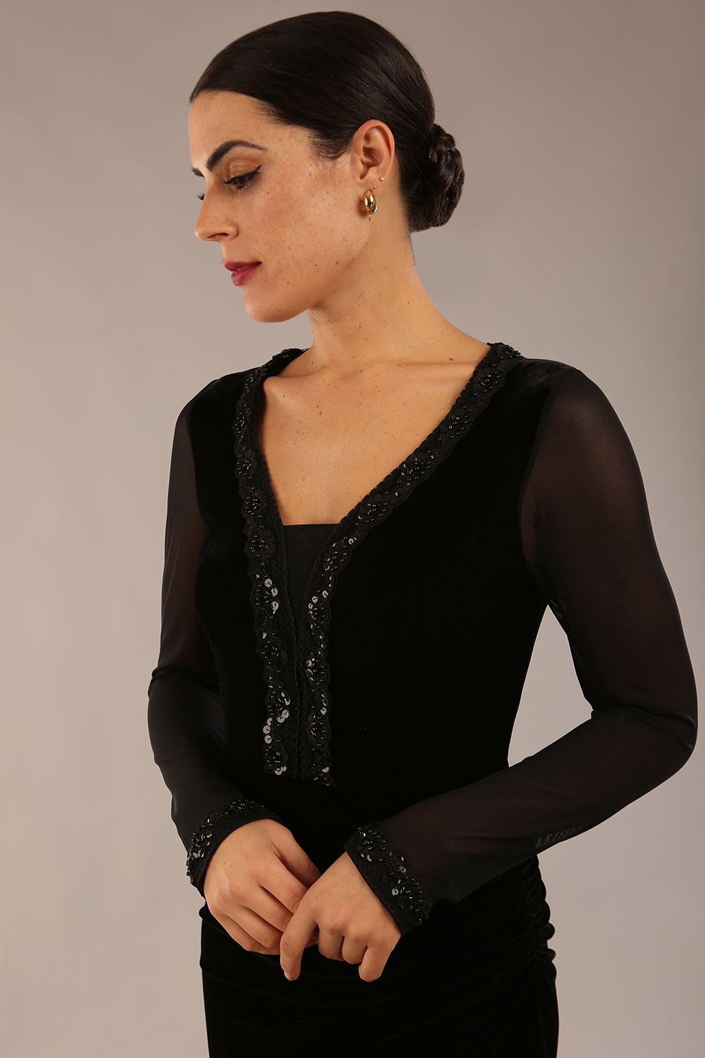 Model wearing diva catwalk Isabella Velvelt Long Sleeve Maxi Length Dress in Black side