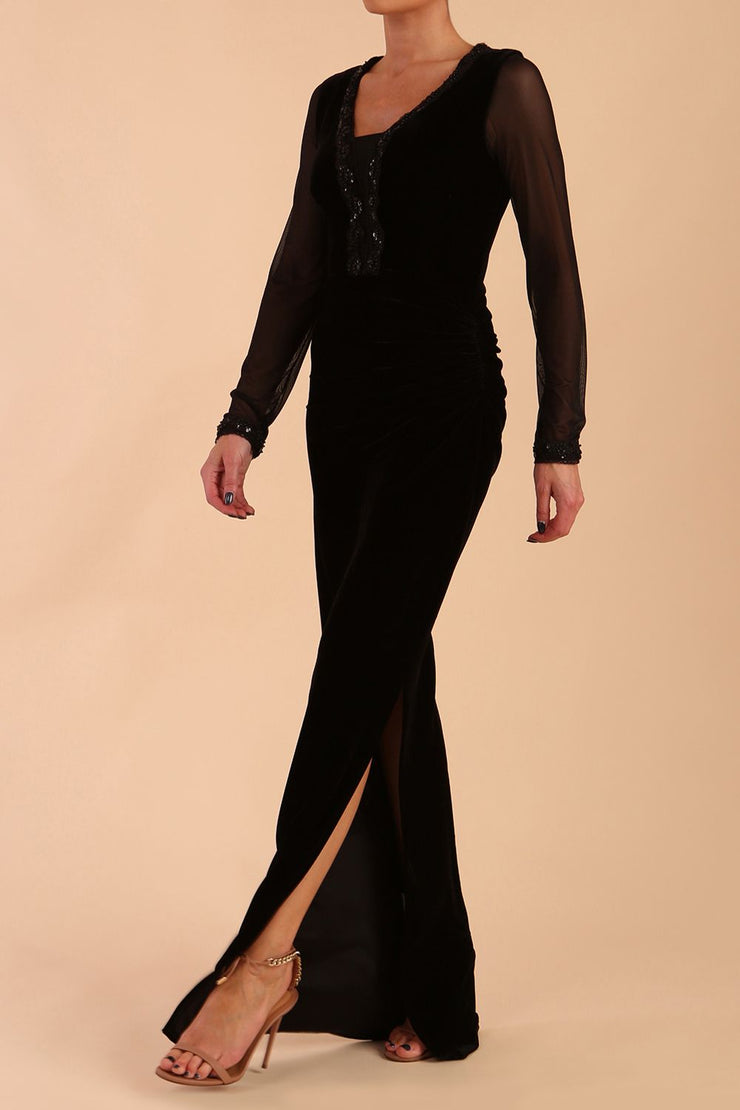 Model wearing diva catwalk Isabella Velvelt Long Sleeve Maxi Length Dress in Black side