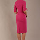 model wearing diva catwalk tryst pencil pink dress with sleeves and belt detail at the front with rounded neckline back (Fuchsia Pink)
