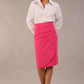 model wearing a diva catwalk Pacific Pencil Skirt with faux wrap detail and pleating on the skirt and knee length in hibiscus pink colour