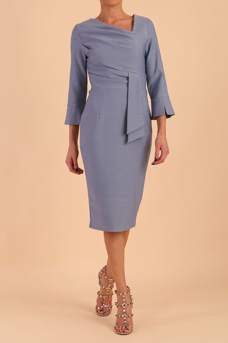 Model wearing diva catwalk Seed Orla Asymmetric Pencil Dress in Steel Blue front