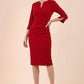 londe model wearing seed tuscany pencil fitted dress in cardinal red colour with a split in the neckline and split detail on sleeves front (Cardinal Red)