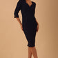 model wearing seed couture zara pencil skirt dress with asymmetric neckline with sleeves in navy blue colour