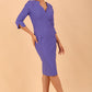 model wearing seed couture zara pencil skirt dress in dawn indigo with asymmetric neckline with sleeves front