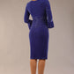 model is wearing a diva catwalk Winsford Velvet Dress with 3/4 peplum sleeve and rushing details knee length pencil dress in Royal Blue velvet colour back