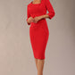 A model is wearing a bistretch pencil three quarter sleeve  and assymetric nackline dress by Diva Catwalk in electric red