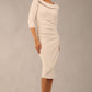 model is wearing diva catwalk seed axford pencil sleeved dress with rounded folded collar in Sandy Cream front 