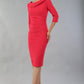 model is wearing diva catwalk seed axford pencil sleeved dress with rounded folded collar in opera pink front